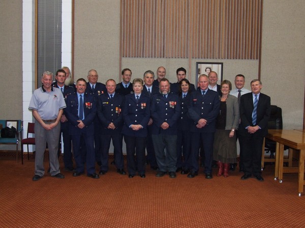 (From left to right) Back Row: Wayne Morrison, Bob Taylor, Peter Taylor, Brett Smythe, Howard Logan, Philip Newland, Aaron White, Andy Baker, Mark Ball. Front Row: Alan Flux, Phil Smith, Bryan Irvine, Linda Wheeler, Murray Gallagher, Gayle Oswald, Neville